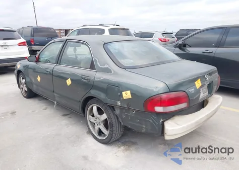 1998 Mazda 626 Dx/Lx z USA, uszkodzony, nr VIN 1YVGF22C3W5772322